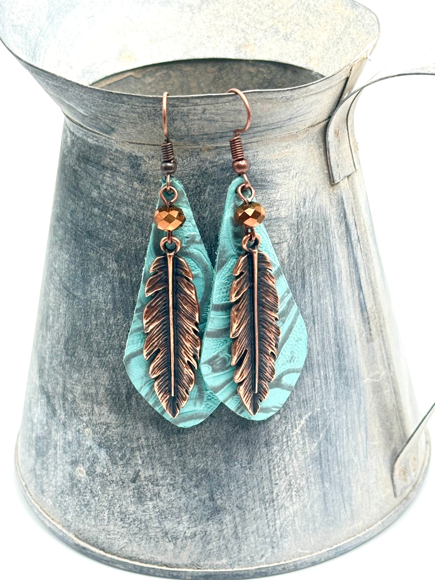 Copper Feathers and Genuine Leather